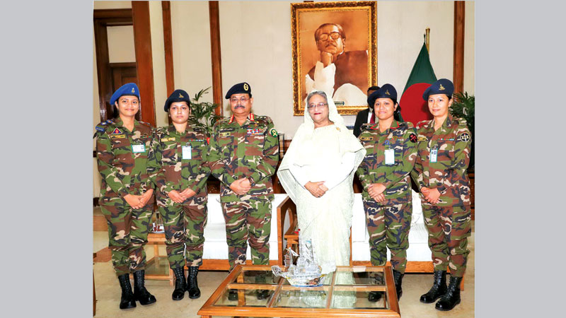 PM greets four  female Lt  colonels