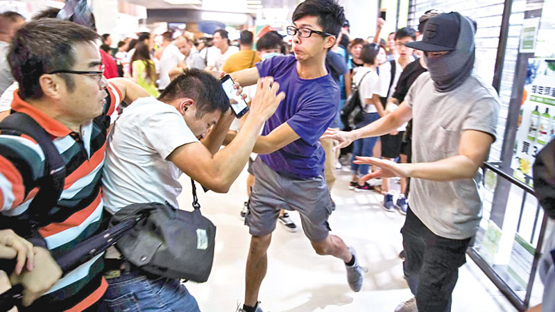 Fights break out at HK mall amid counter protests