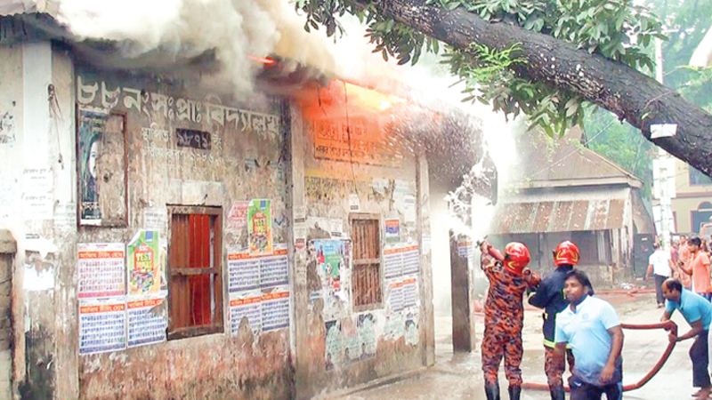 Fire burns down 2 school buildings