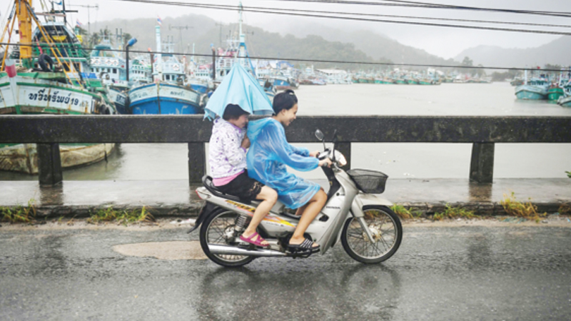 Floods, blackouts after Thai storm, but tourist islands spared