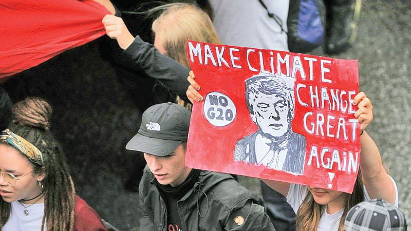 Stormy G20 ends with opt-outs for Trump on climate, trade