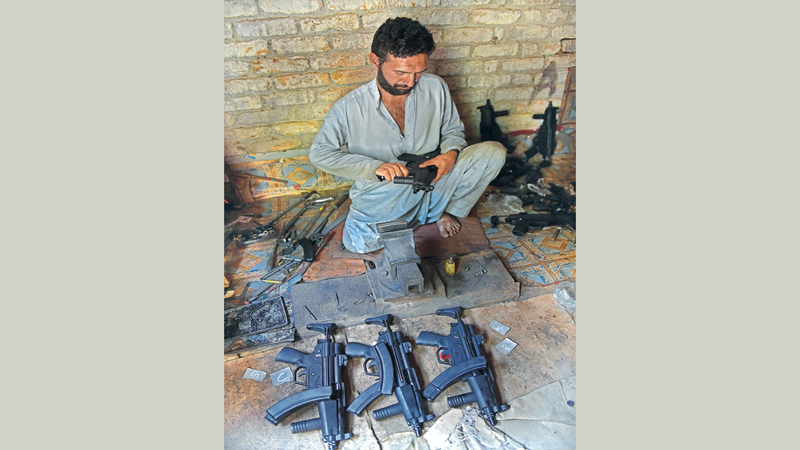 Guns cheaper than smartphones in Pakistani tribal town