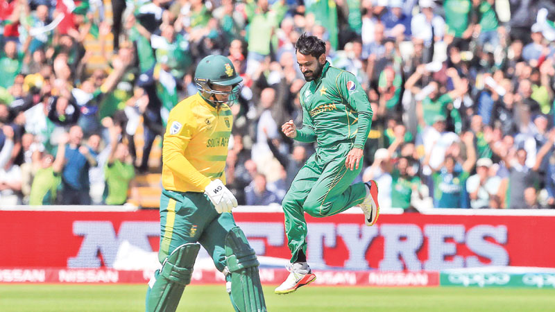 Pakistan sparkle in rain-hit match