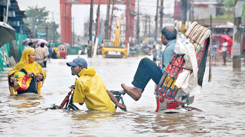 Heavy rain
submerges
parts of
port city   