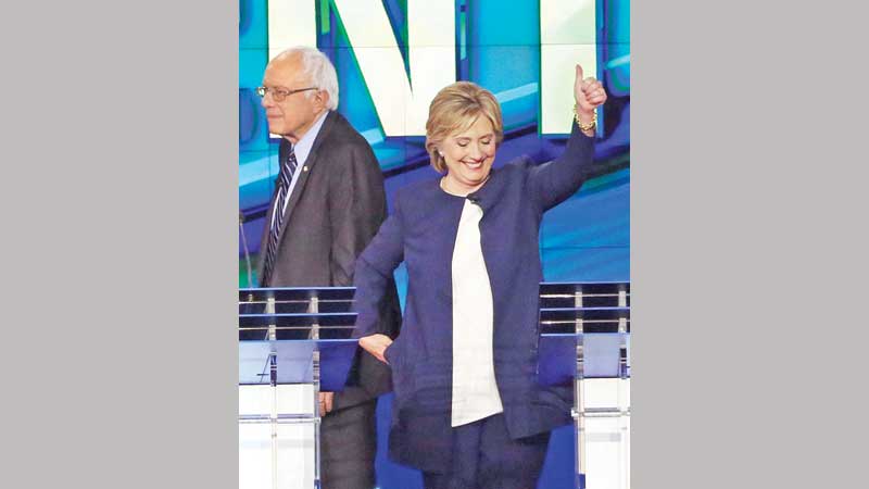 Hillary fends off rivals in first Democratic debate