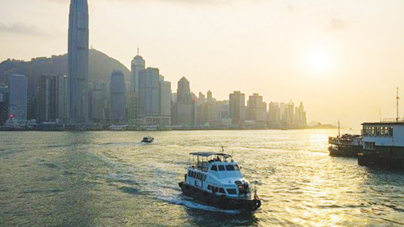 Hong Kong ends tough year with gains after Trump hails trade progress