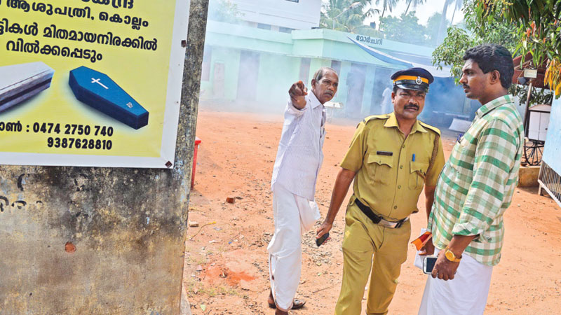 Desperate search for loved ones in India temple blast; 5 detained 