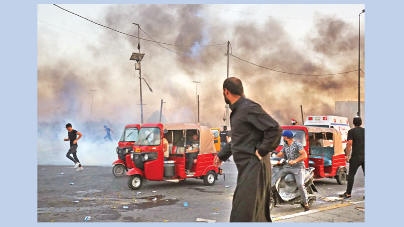 Iraq PM pledges reforms to calm angry protests