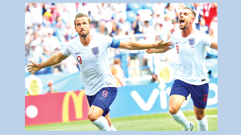 Kane treble inspires England 
to WC knockout stage