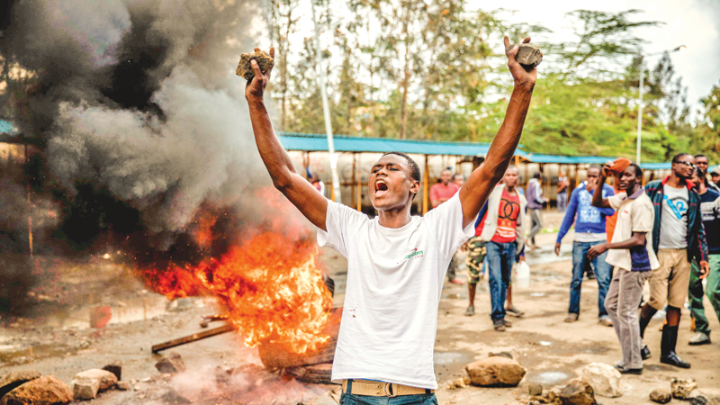 Kenyans vote in fractious second poll, boycotted by opposition