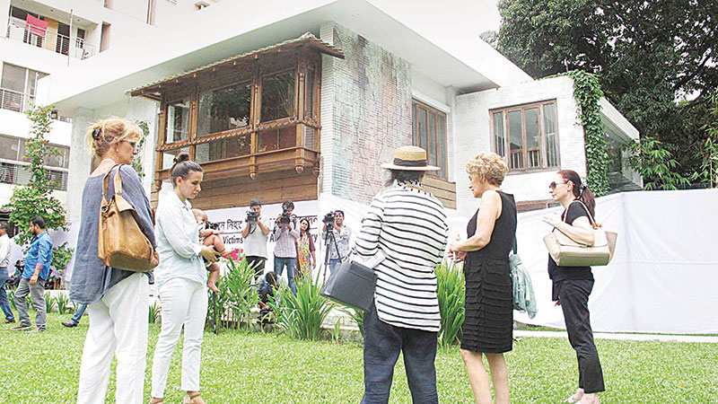 Kin of victims gather 
at terror site