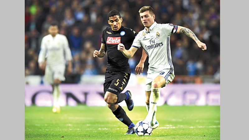 Real bounce back to down Napoli