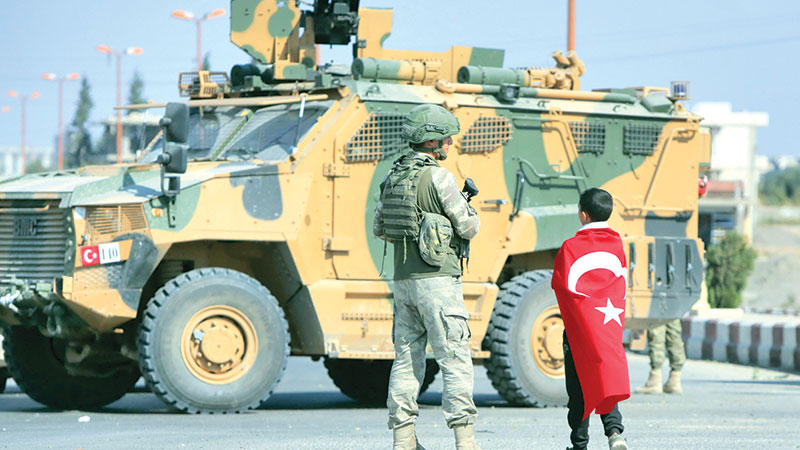 Kurdish forces start Syria-Turkey border pullback
