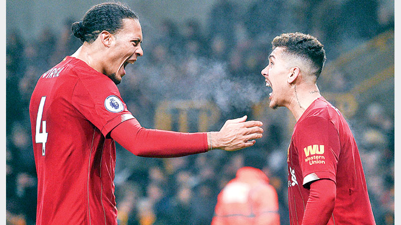Late Firmino strike stuns Wolves