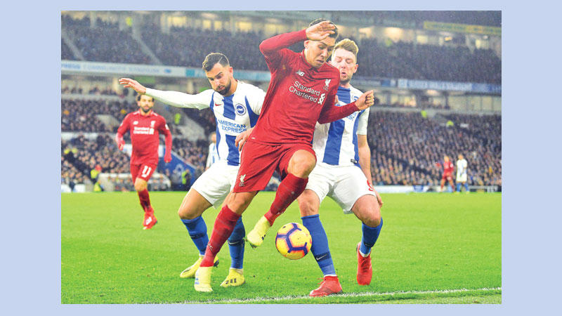 Liverpool seven points clear