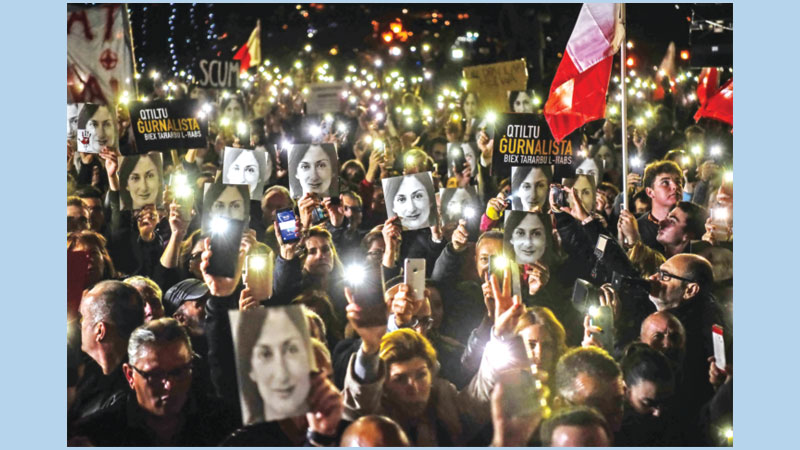 Malta PM to step down over slain reporter case