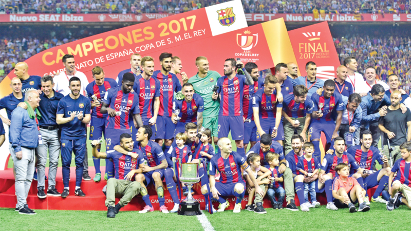 Messi magic steers Barca to retain Copa del Rey