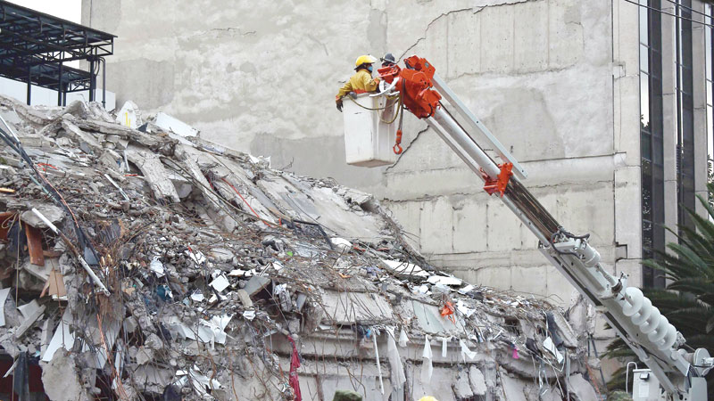 Rescuers in grim search for survivors