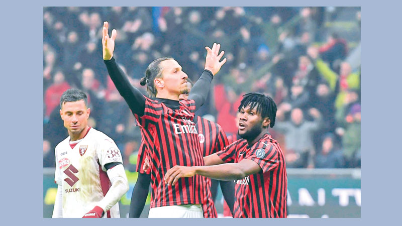 Milan set up semi-final clash with Juve