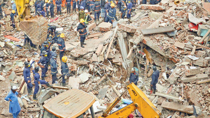 Mumbai building collapse kills 18 after heavy rains