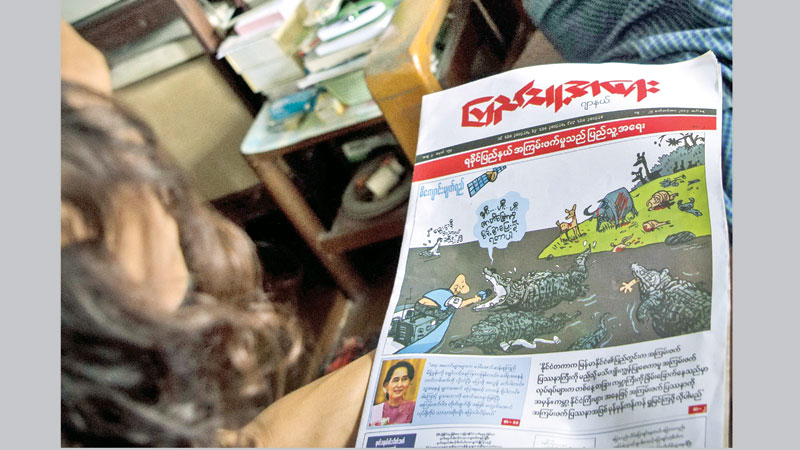 Myanmar cartoonists 
lead media-jeering 