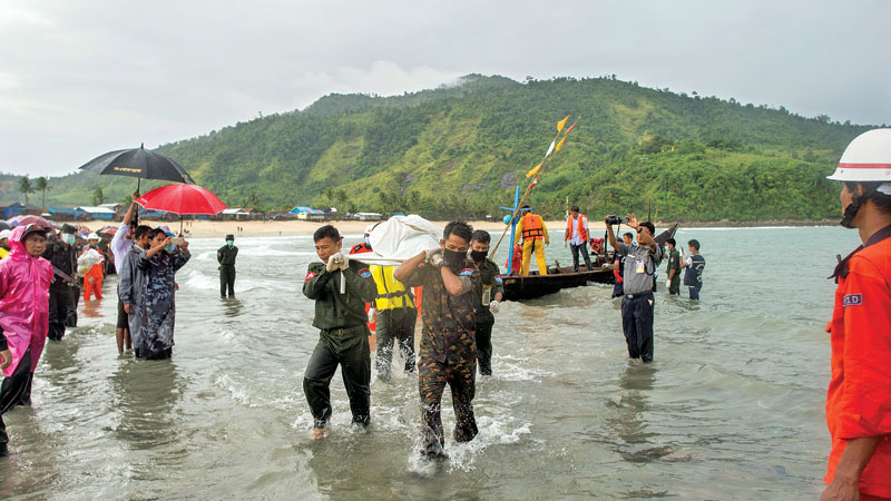 Rescuers pull bodies from plane wreck in Myanmar sea