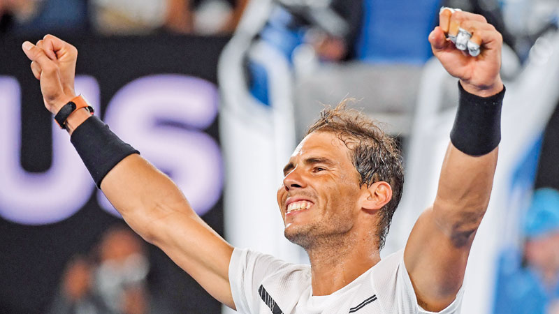 Nadal, Serena reach last eight