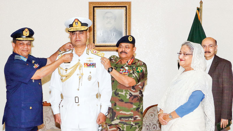 New Navy chief adorned with rank badge