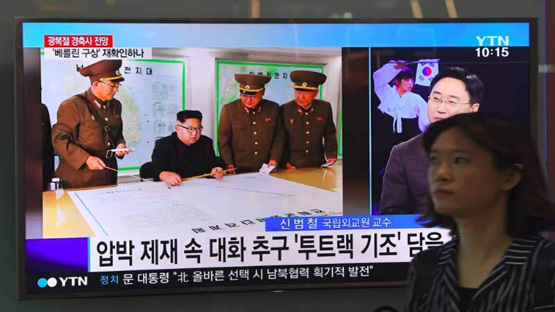 N Korea releases video of �new�  
sub-launched missile test