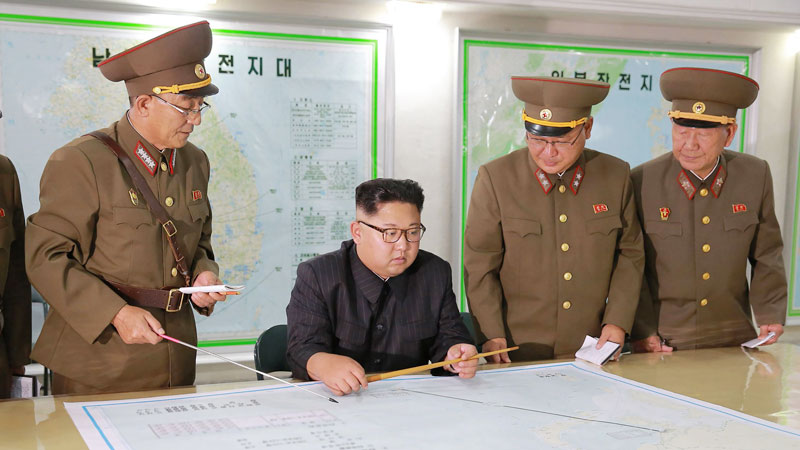 North Korea leader holds off on Guam missile plan