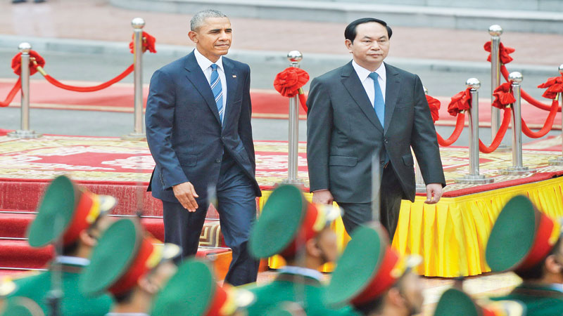 Obama banishes Vietnam war 
era with lifting of arms ban
