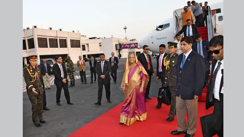 PM returns home from Cambodia