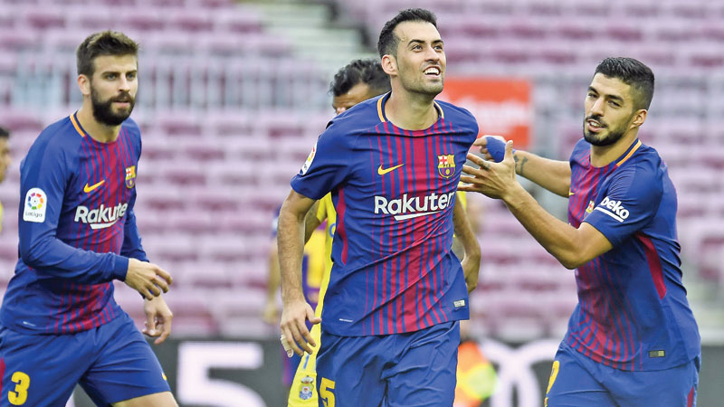 Proud Pique a lightning 
rod in Catalonia chaos