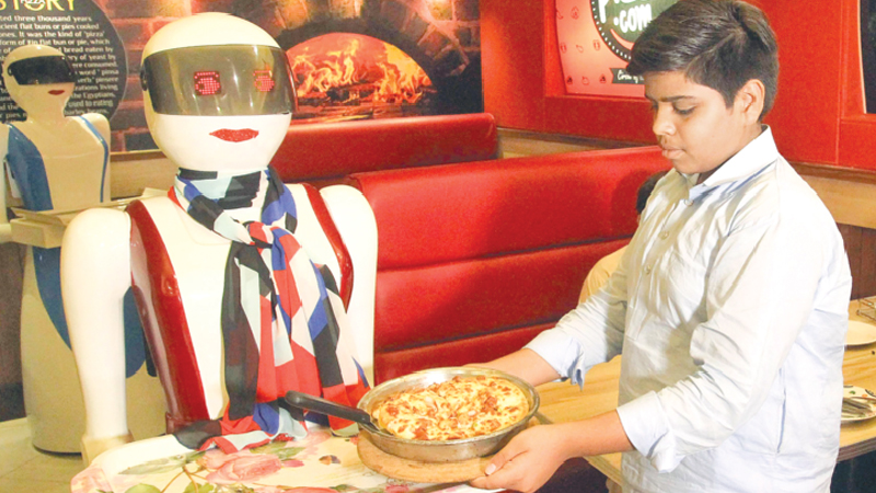 Pizza bytes! Pakistan enchanted by first robot waitresses