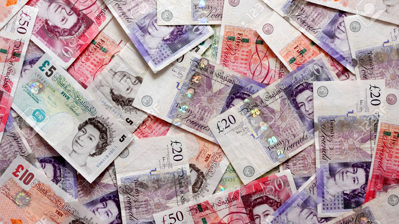 Pound plunges as UK ministers quit over Brexit deal