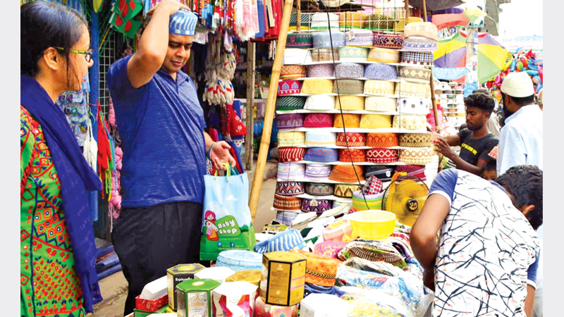 Prayer cap, atar sales rise in Rajshahi
