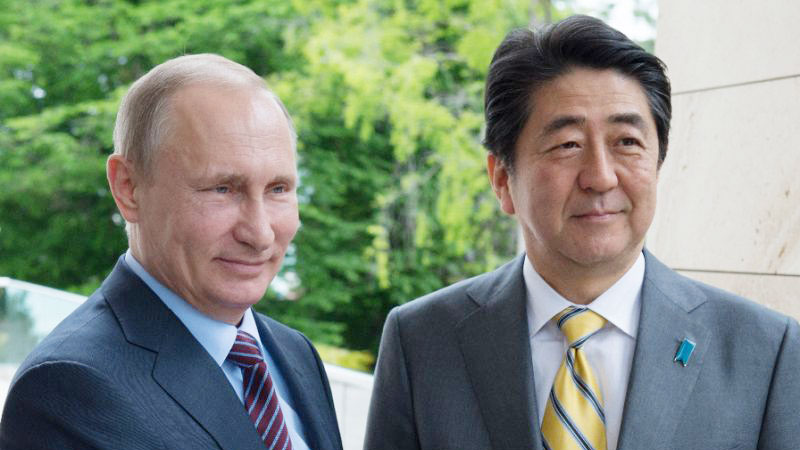 Putin, Abe hold hot spring meet on WWII island row