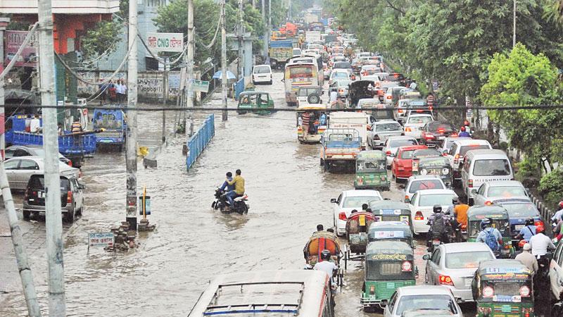 Rain disrupts Dhaka life