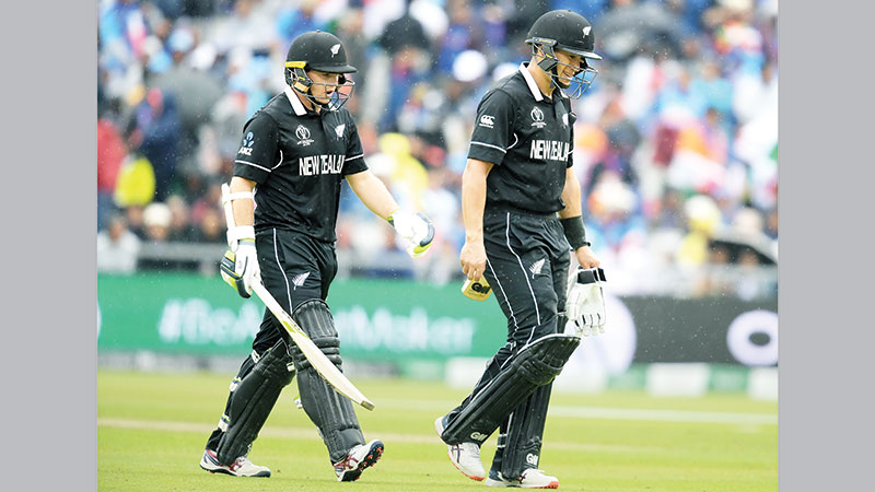 Rain takes India-NZ semi into reserve day