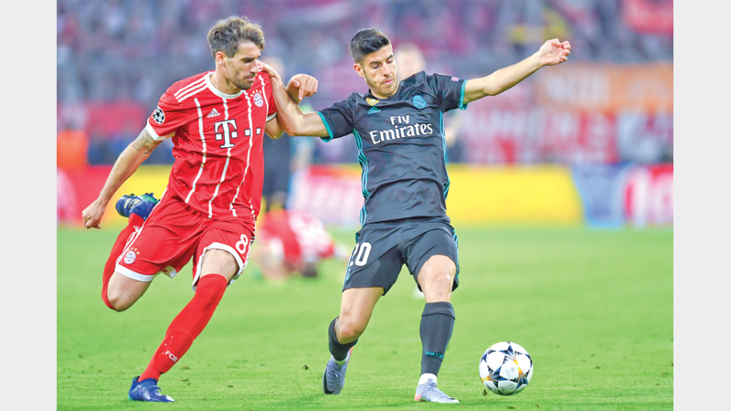 Real in pole position beating Bayern
