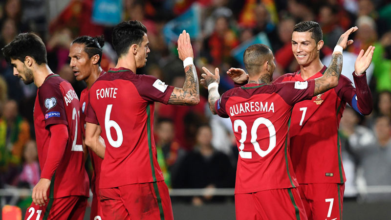 Belgium, Portugal sail through 