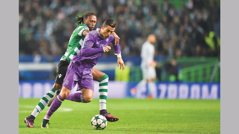 Leicester march into last 16 with Real