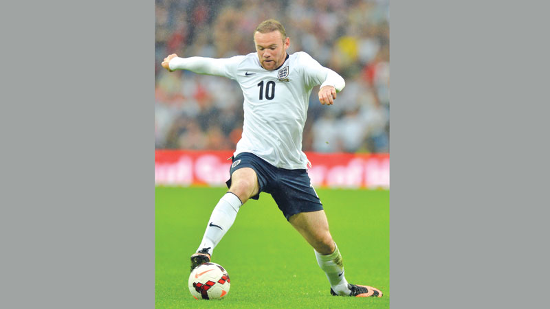 Rooney calls time on 
England despite recall 