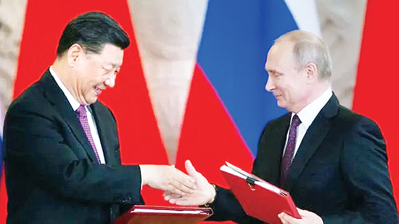 Russia, China to show united front at economic forum