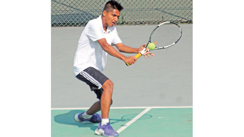 Faruq earns a double crown in junior tennis