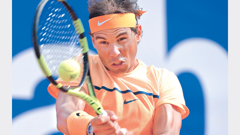 Nadal, Nishikori ease through 