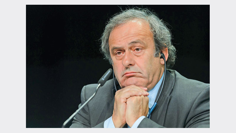 Platini pulls out of FIFA race, vows to clear name