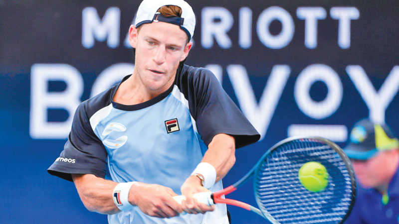 Schwartzman slumps in heat 