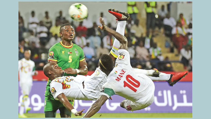 Senegal first team to reach quarters