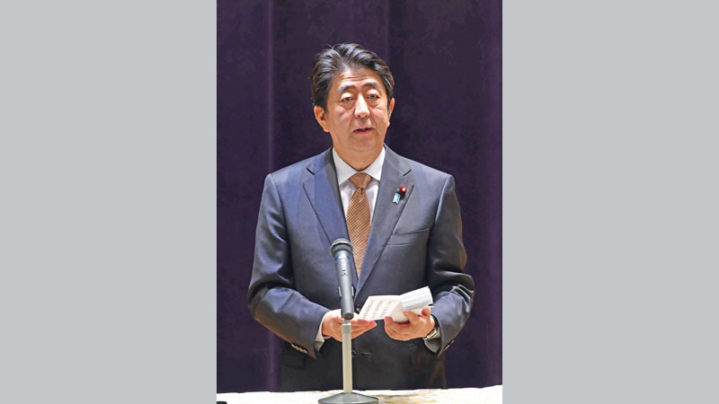 Japan PM faces make-or-break 
test three years later